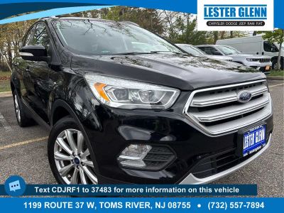 2017 Ford Escape Titanium in Shadow Black — front three-quarter view