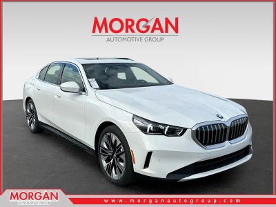 2026 BMW 5 Series 530i in White — front three-quarter view