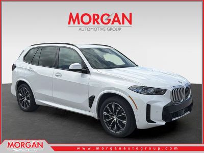 2025 BMW X5 xDrive40i in White — front three-quarter view