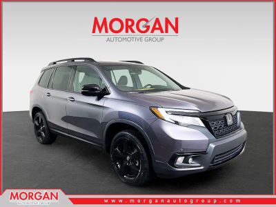 2021 Honda Passport Elite in Gray — front three-quarter view