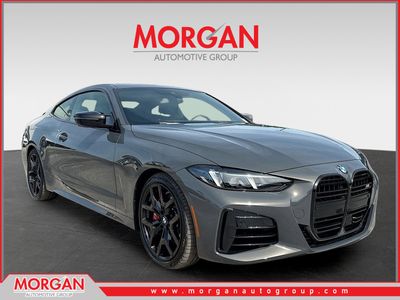 2026 BMW 4 Series M440i in Dravit Grey Metallic — front three-quarter view