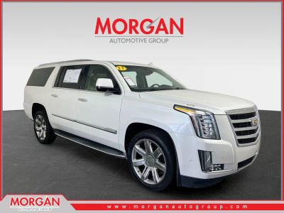 2017 Cadillac Escalade ESV Luxury in Crystal White Tricoat — front three-quarter view