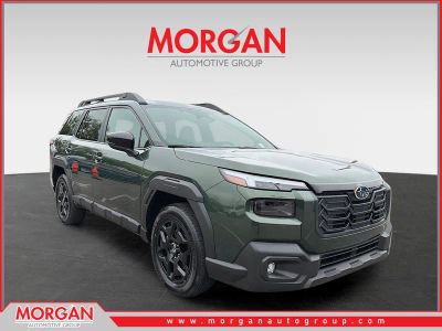 2026 Subaru Outback Limited in Deep Emerald Green Pearl — front three-quarter view