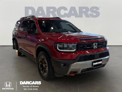 2026 Honda Passport Base in Radiant Red — front three-quarter view