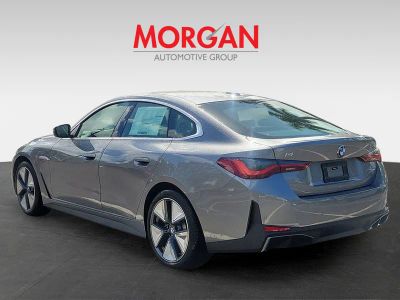 2026 BMW i4 — rear three-quarter view