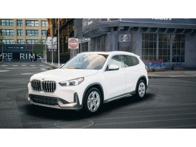2026 BMW X1 xDrive28i in Alpine White — front three-quarter view