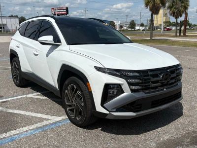 2025 Hyundai Tucson Limited in White — front three-quarter view