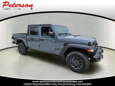 2026 Jeep Gladiator GLADIATOR SPORT 4X4 in Anvil Clear-Coat Exterior Paint — front three-quarter view