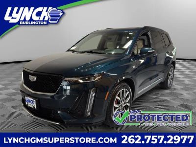 2024 Cadillac XT6 Sport in Emerald Lake Metallic — front three-quarter view