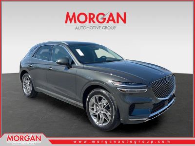 2025 Genesis GV70 2.5T in Green — front three-quarter view