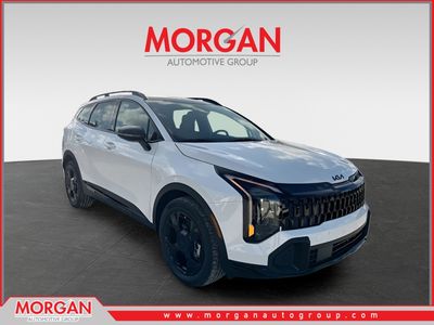 2026 Kia Sportage Plug-In Hybrid X-Line in Snow White Pearl — front three-quarter view