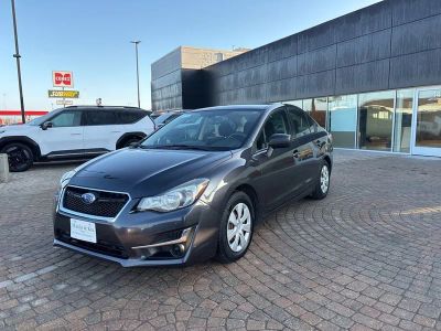 2015 Subaru Impreza 2.0i in Dark Gray Metallic — front three-quarter view