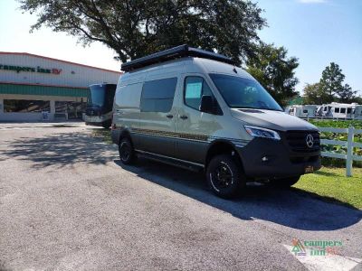 2027 Storyteller Overland Storyteller Overland in STONE GRAY — front three-quarter view