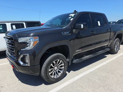 2020 GMC Sierra 1500 AT4 in Black — front three-quarter view