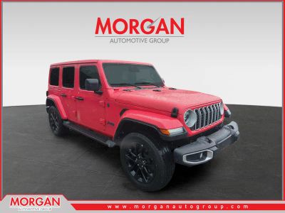 2025 Jeep Wrangler Sahara 4xe in Red — front three-quarter view