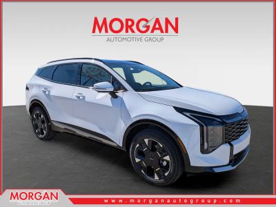 2026 Kia Sportage SX-Prestige in Glacial White Pearl — front three-quarter view