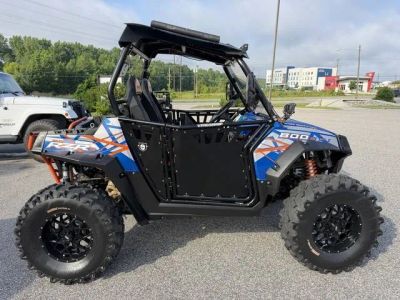 2013 Polaris® RZR® S 800 Blue Fire and Orange LE — front three-quarter view