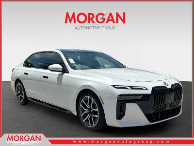 2023 BMW 7 Series 740i in Mineral White Metallic — front three-quarter view