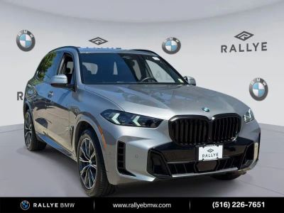 2024 BMW X5 xDrive40i in Gray Metallic — front three-quarter view
