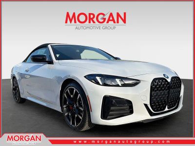 2026 BMW 4 Series 430i in Alpine White — front three-quarter view