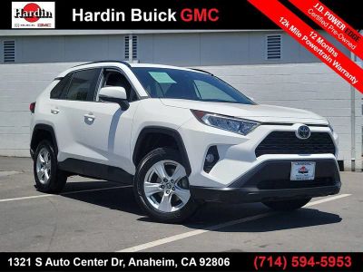 2019 Toyota RAV4 XLE in White — front three-quarter view