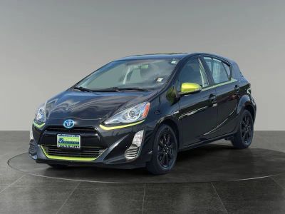 2016 Toyota Prius c — rear three-quarter view