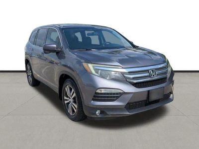 2016 Honda Pilot — rear three-quarter view
