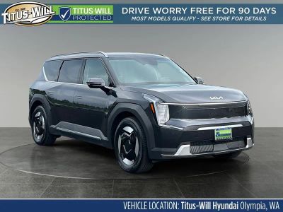 2024 Kia EV9 Wind in Panthera Metal — front three-quarter view