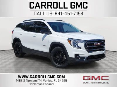 2023 GMC Terrain AT4 in Summit White — front three-quarter view