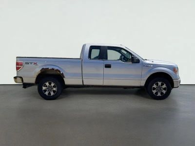 2013 Ford F-150 — rear three-quarter view