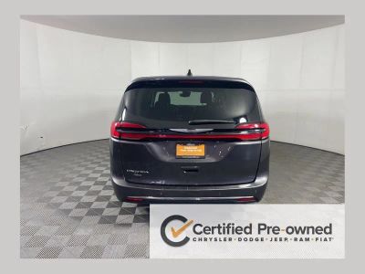 2023 Chrysler Pacifica Touring L in Granite Crystal Metallic Clearcoat — front three-quarter view