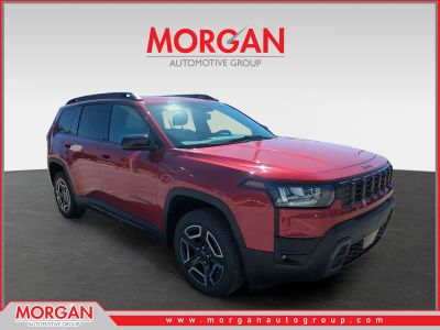 2026 Jeep Cherokee Laredo in Red — front three-quarter view