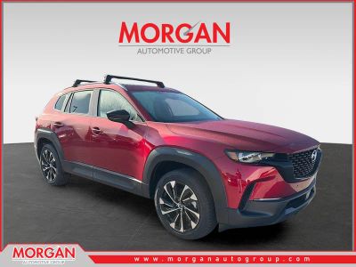 2026 Mazda CX-50 Hybrid Premium Plus in Soul Red Crystal Metallic — front three-quarter view