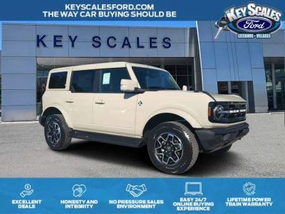 2025 Ford Bronco Outer Banks in Desert Sand — front three-quarter view