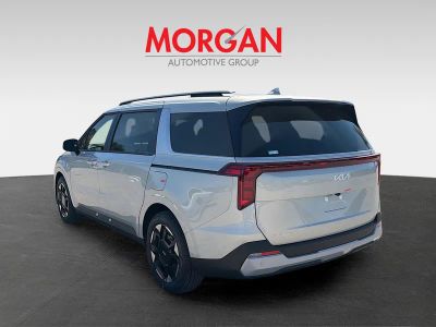 2026 Kia Carnival — rear three-quarter view