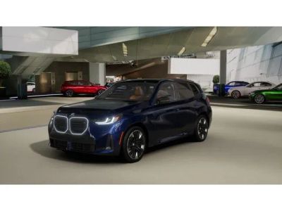 2026 BMW X3 M50 xDrive in Tanzanite Blue II Metallic — front three-quarter view