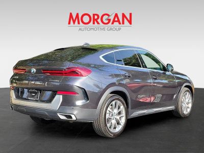 2021 BMW X6 — rear three-quarter view