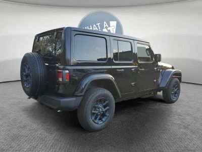 2026 Jeep Wrangler — rear three-quarter view