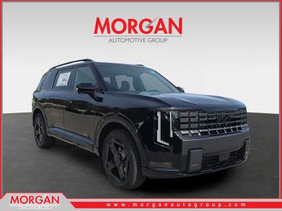 2027 Kia Telluride Hybrid X-Line SX-Prestige in Ebony Black — front three-quarter view