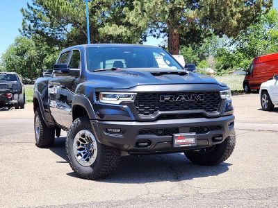 2026 RAM 1500 RAM 1500 RHO CREW CAB 4X4 5'7' BOX in Forged Blue Metallic Exterior Paint — front three-quarter view