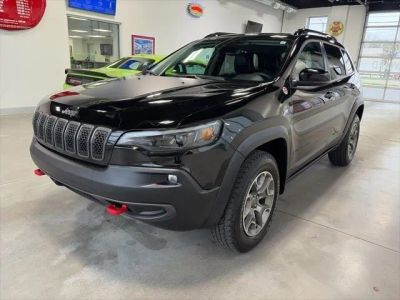 2022 Jeep Cherokee Trailhawk 4x4 in Diamond Black Crystal Pearlcoat — front three-quarter view