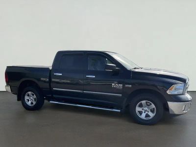 2019 RAM 1500 Classic SLT in Brilliant Black Crystal Pearlcoat — front three-quarter view
