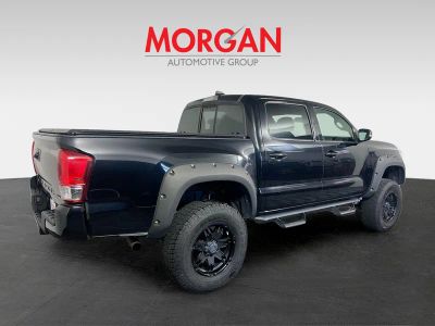 2016 Toyota Tacoma — rear three-quarter view