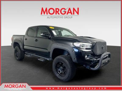 2016 Toyota Tacoma TRD Sport in Black — front three-quarter view