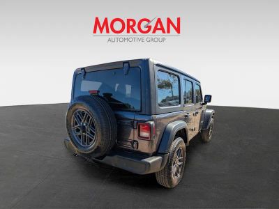 2026 Jeep Wrangler — rear three-quarter view