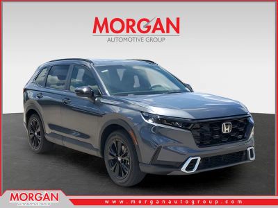 2026 Honda CR-V Hybrid Sport Touring in Meteorite Gray Metallic — front three-quarter view