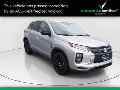 2025 Mitsubishi Outlander Sport LE 2.0 AWC — front three-quarter view