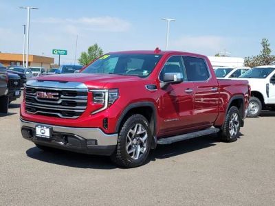 2024 GMC Sierra 1500 SLT in Volcanic Red Tintcoat — front three-quarter view