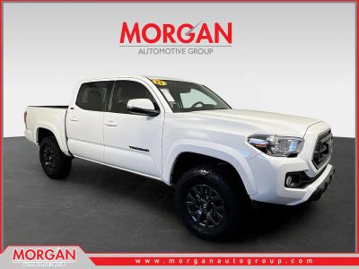 2023 Toyota Tacoma SR5 in Ice Cap — front three-quarter view