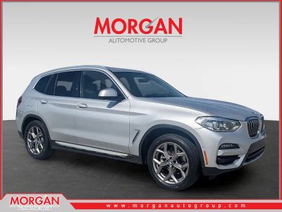 2021 BMW X3 sDrive30i in Glacier Silver Metallic — front three-quarter view